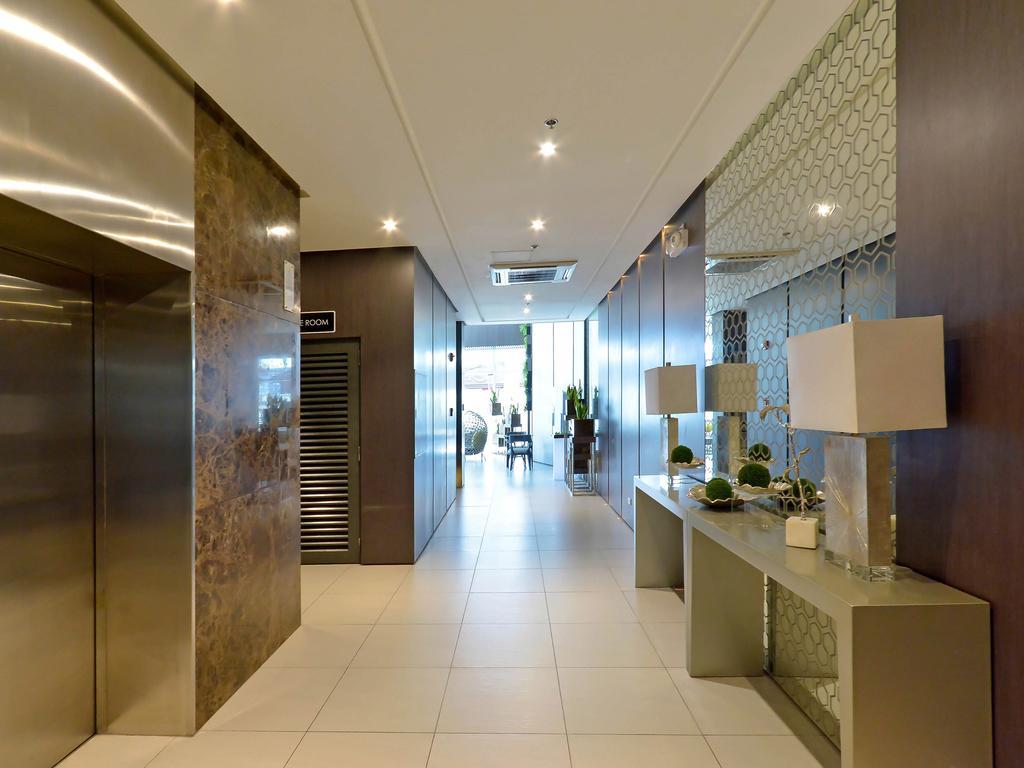 Currency Serviced Suites Манила Экстерьер фото